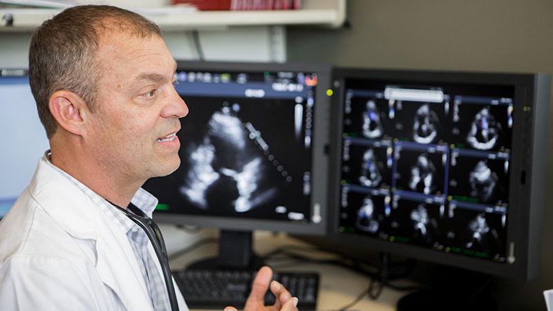 doctor looking at computer monitor