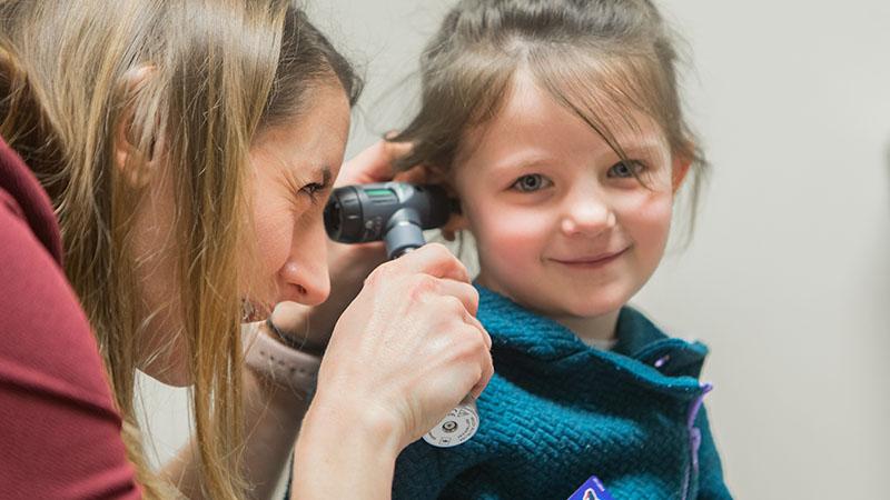 SPH doctor with pediatric patient